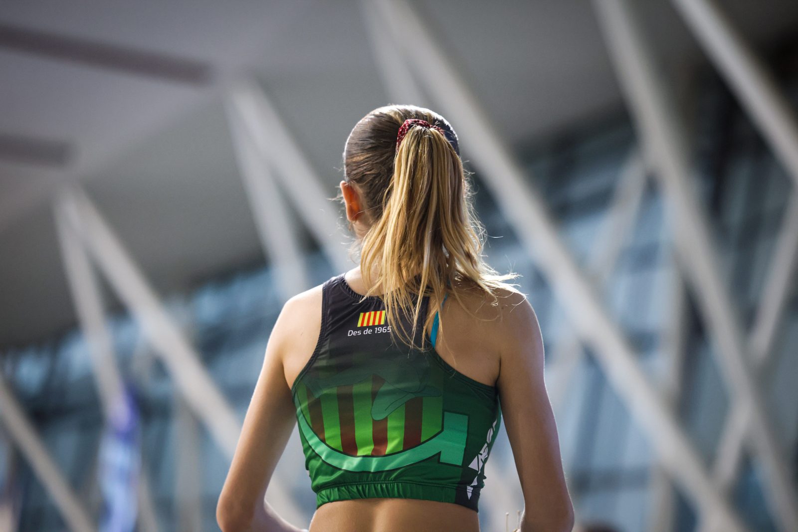Claudia running on the track